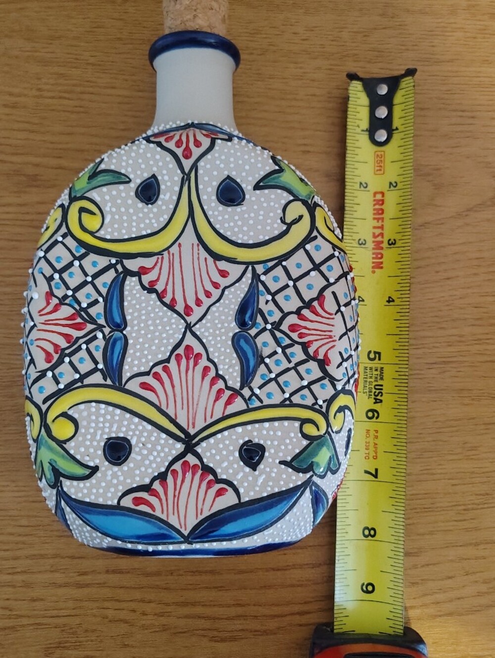 Talavera-style ceramic tequila bottle from Mexico.